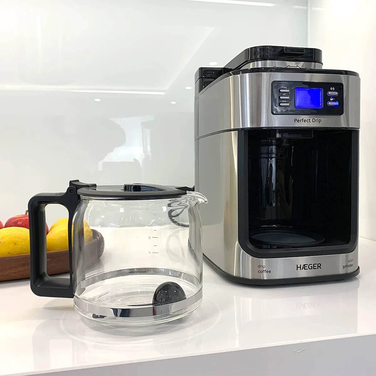 HAEGER Drip - Macchina da caffè a goccia automatica con smerigliatrice, 1050 W, capacità: 1,2 l, piastra riscaldata per mantenere caldo, capacità di macinino: 60 g, schermo LCD, timer 24 ore