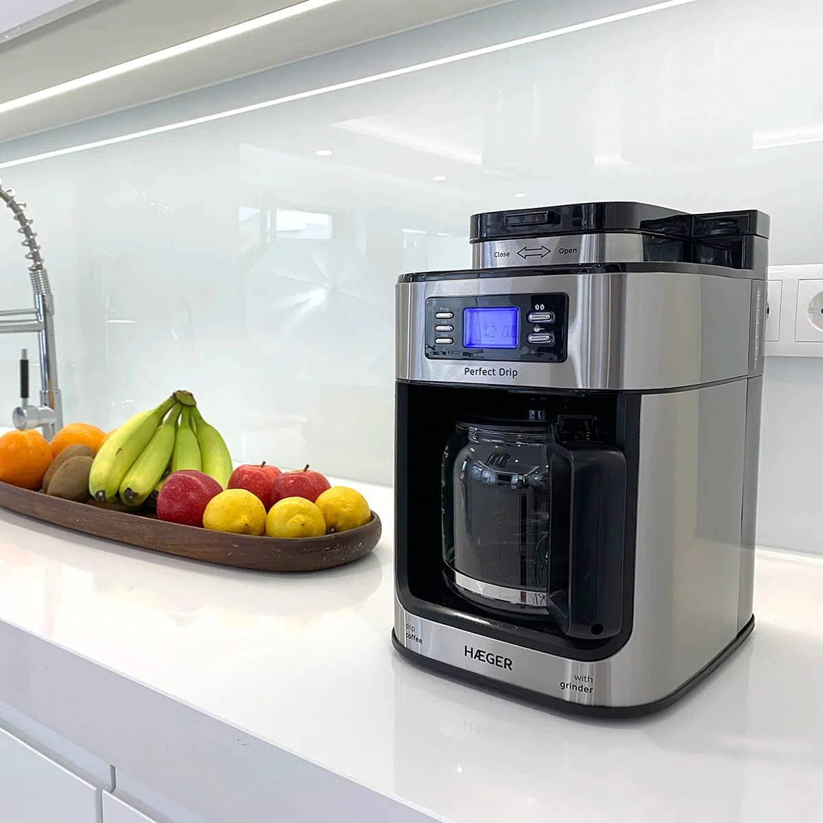 HAEGER Drip - Macchina da caffè a goccia automatica con smerigliatrice, 1050 W, capacità: 1,2 l, piastra riscaldata per mantenere caldo, capacità di macinino: 60 g, schermo LCD, timer 24 ore